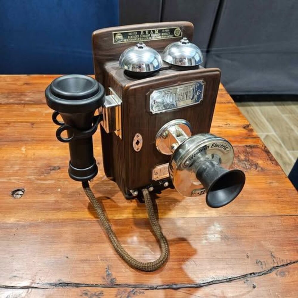 Jim.  Beam 1913 Wall Set telephone whiskey decanter.